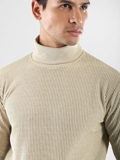 Beige Turtle Neck Sweatshirt Man in beige ribbed turtleneck sweatshirts for men | Beyoung