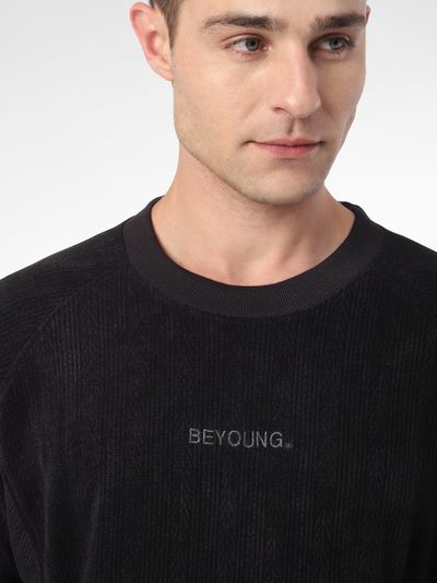 Black Cut and Sew Sweatshirt Man in a burgundy mens sweatshirts with curly hair | Beyoung