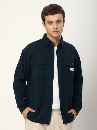 Blue shacket with buttoned chest pockets, 