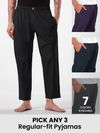 Mens pyjama pants with regular fit in different colors with text &quot;Pick any 3&quot; and &quot;8 colors available.&quot;