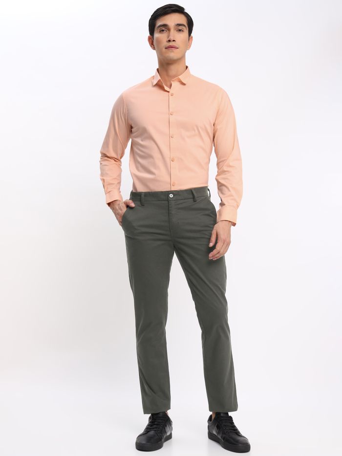 Peach shirt and gray pants 2025