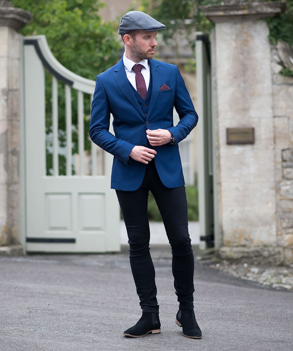 green blazer black pants